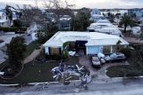 Budovy a stavby poškozené hurikánem Milton po jeho příchodu na pevninu, Venice, Florida, USA, 10. října 2024