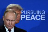 Vladimir Putin a Donald Trump na tiskové konferenci po jejich jednání o budoucnosti Ukrajiny
