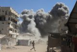 Následky izraelského útoku na město Gaza