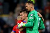 Michal Sadílek s brankářem Matějem Kovářem