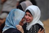 Truchlící palestinské ženy po útoku na Pásmo Gazy
