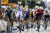 Tim Merlier slaví vítězství v 9. etapě Tour de France