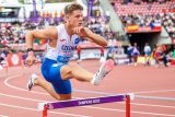 Michal Rada v závodě na 400 metrů překážek