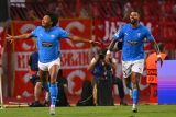 Fotbalisté Pafosu slaví gól do sítě Crvene Zvezdy