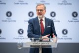 Premiér Petr Fiala (ODS) na tiskové konferenci po jednání vlády