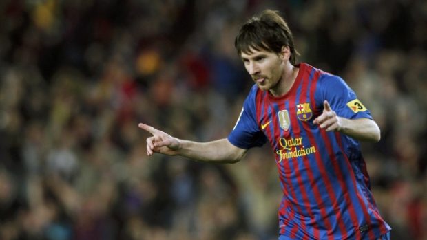 Barcelona&#039;s Lionel Messi  celebrates a goal during their Spanish first division soccer match against Espanyol at Camp Nou stadium in Barcelona  May 5, 2012