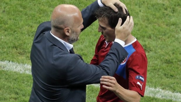 Czech head coach Michal Bílek, left, hugs Vladimír Darida after he was subsituted during the Euro 2012 soccer championship quarterfinal match between Czech Republic and Portugal in Warsaw, Poland, Thursday, June 21, 2012. (AP Photo/Gero Breloer)