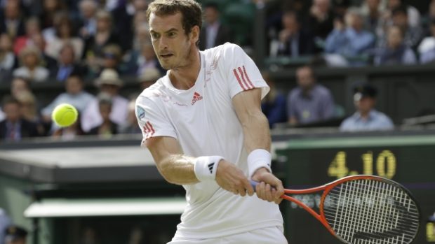Andy Murray of Britain plays a shot to David Ferrer of Spain during a quarterfinals match at the All England Lawn Tennis Championships at Wimbledon, England, Wednesday July 4, 2012.