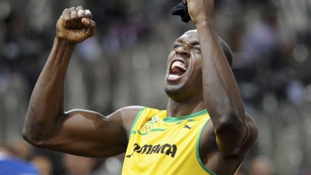 Jamaica&#039;s Usain Bolt gestures to the crowd after winning the men&#039;s 100m final during the London 2012 Olympic Games at the Olympic Stadium August 5, 2012