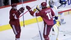 Phoenix Coyotes&#039; Radim Vrbata  (L) celebrates his goal with teammate Martin Hanzal (11) in front of Nashville Predators&#039; goalie Pekka Rinne and Roman Josi (R) during the first period of Game 1 of their NHL Western Conference semi-final hockey playoffs