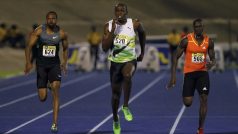 Usain Bolt (C) of Jamaica  sprints to win the men&#039;s 100 metres event at the Jamaica  International Invitational track and field meet in Kingston, May 5, 2012