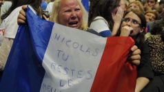 Příznivci Nicolase Sarkozyho vyjadřují svůj smutek