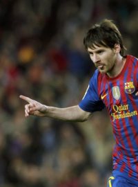 Barcelona&#039;s Lionel Messi  celebrates a goal during their Spanish first division soccer match against Espanyol at Camp Nou stadium in Barcelona  May 5, 2012