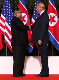 Donald Trump a Kim Čong-un při společném setkání