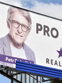 Předvolební billboard Realisté